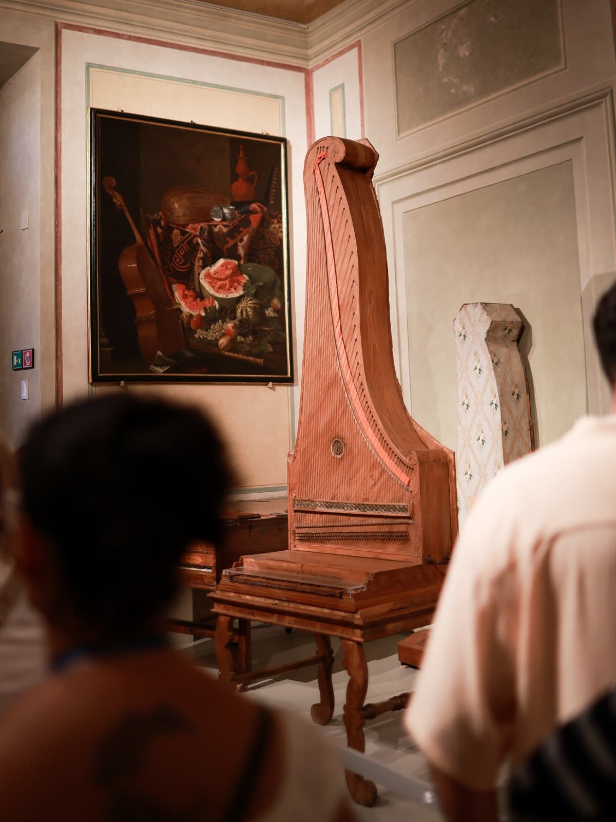 Upright piano with a structure reminiscent of a cabinet located in the Accademia Gallery