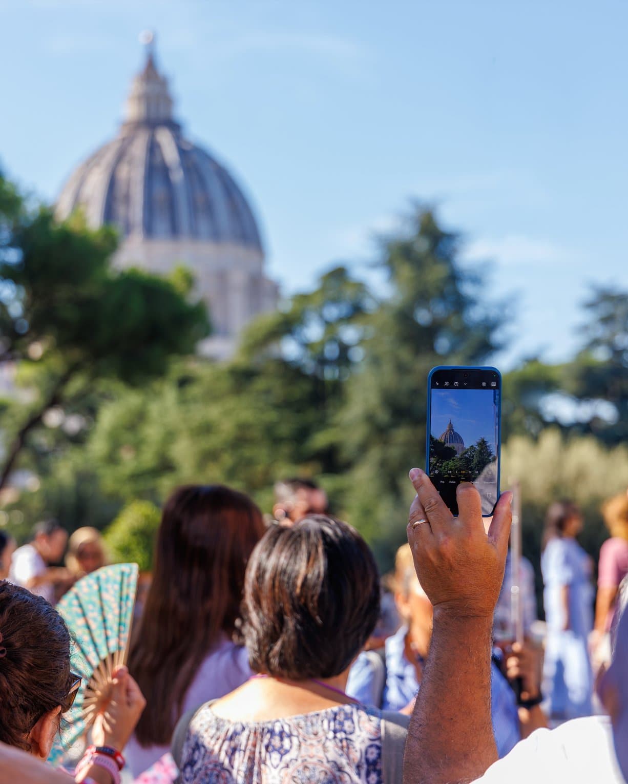 Visitor photographs St. Peter's Dome during a Vatican Museums tour